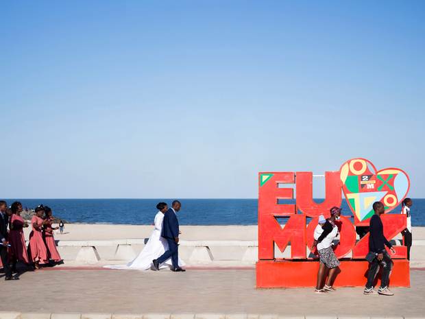 An installation for regional beer brand 2M on the ­coastal path alongside the Indian Ocean proclaims “Eu amo Moçambique” – I love Mozambique. The bridal couple and wedding party parading past it in all their finery are probably feeling just as euphoric on this special day.
