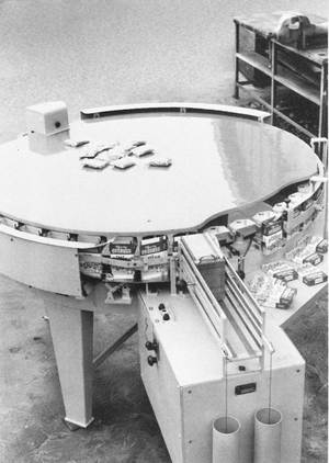 The Kisters RAKA machine, a rotary carton erector, sealer and filler for vacuum-packed peanuts from 1965.